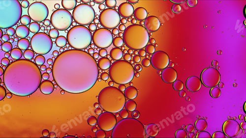 Preview: Abstract Colorful Food Oil Drops Bubbles and spheres Flowing on Water Surface