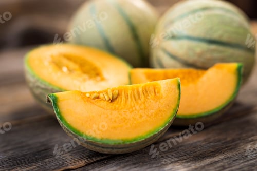 Preview: Fresh melons on wooden table