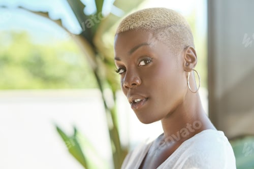 Preview: Pensive African American woman looking at camera