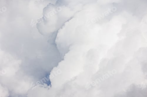 Preview: white cumulus clouds in blue sky, beautiful view of the sky and storm clouds. Huge majestic cloud