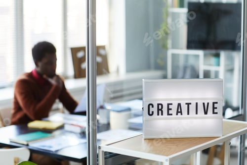 Preview: Background image of CREATIVE light up sign on table in office with person working, copy space