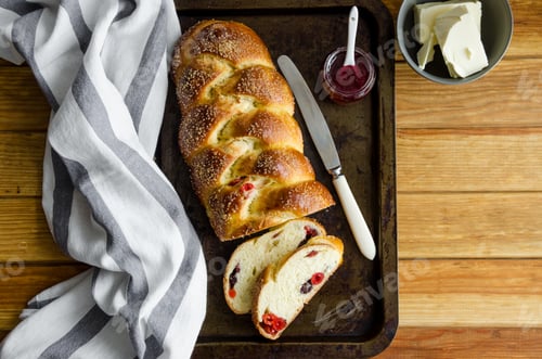Preview: Easter bread with raisins, dried cherries, jam and butter. Cozonac - Bulgarian Easter bread