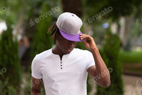Preview: a male person wearing blank sport snapback cap mockup template