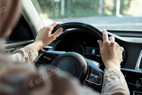 Preview: Unrecognizable Woman Driving Car