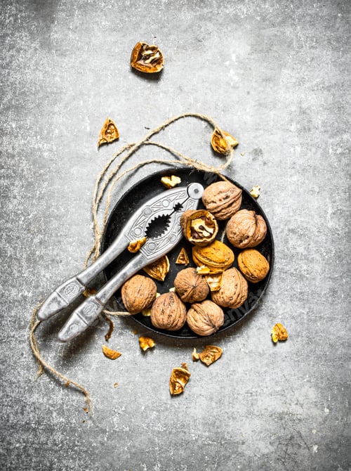 Preview: Walnuts in bowl with Nutcracker.