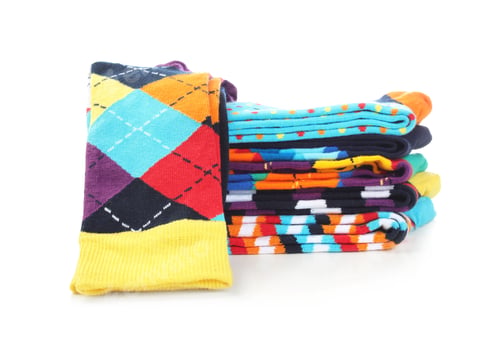 Preview: Many new colorful socks on white background
