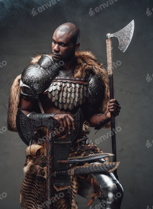 Preview: Armoured handsome soldier from past with axes in foggy background