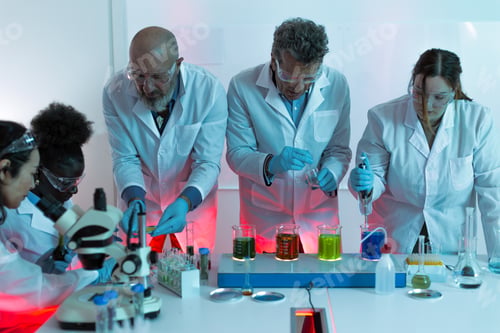 Preview: Diverse scientists collaborating on laboratory research experiment