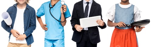 Preview: panoramic crop of multicultural kids in costumes of different professions holding blueprint, frying