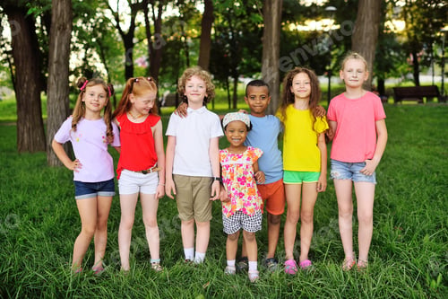 Preview: group of preschoolers of different races hug and smile