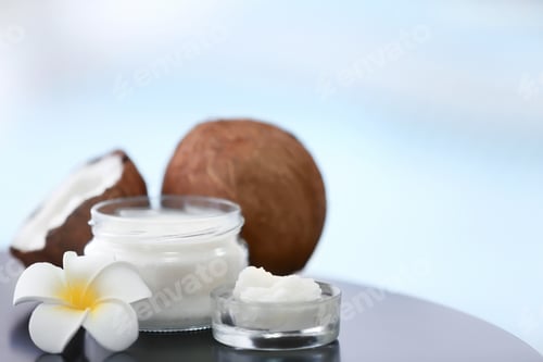 Preview: Composition with coconut butter in glass jar on blurred background