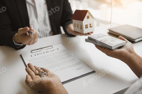 Preview: Insurance brokers are pointing to insurance contract signing and are explaining to customers at the