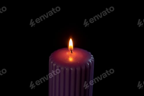 Preview: Purple candle with orange flame over black background