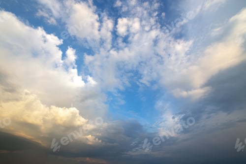 Preview: Blue sky covered with white puffy clouds