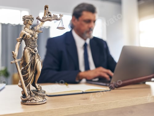 Preview: Justice, statue and man in office with laptop at law firm desk, online research for court advice an