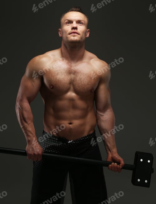 Preview: Muscular guy holding hummer