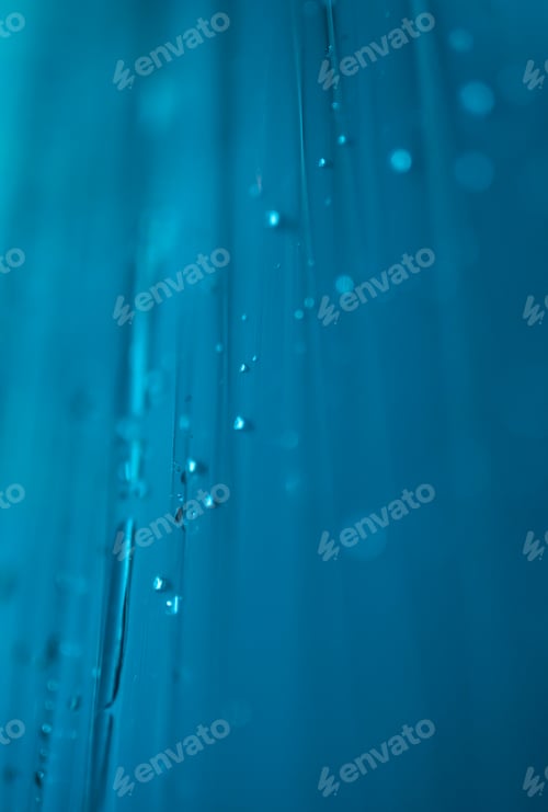 Preview: water drops on blue plastic foil abstract
