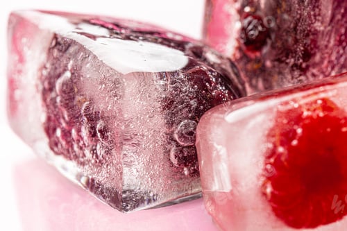 Preview: Close up of ice cubes with berries