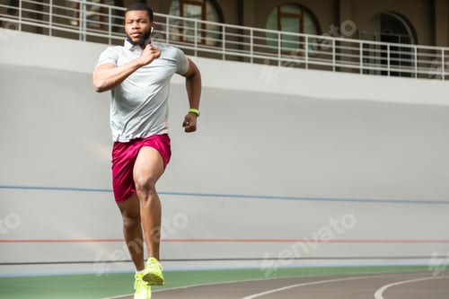 Preview: Strong young African American athletic man in sneakers