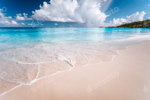 Preview: White clouds above blue ocean lagoon with calm waves on tropical beach. Summer vacation holiday