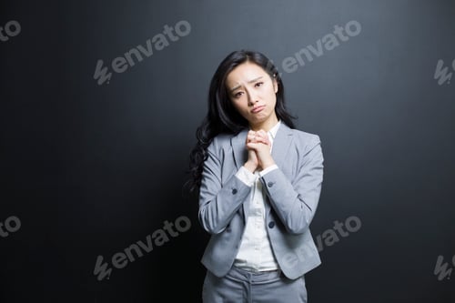 Preview: Worried businesswoman