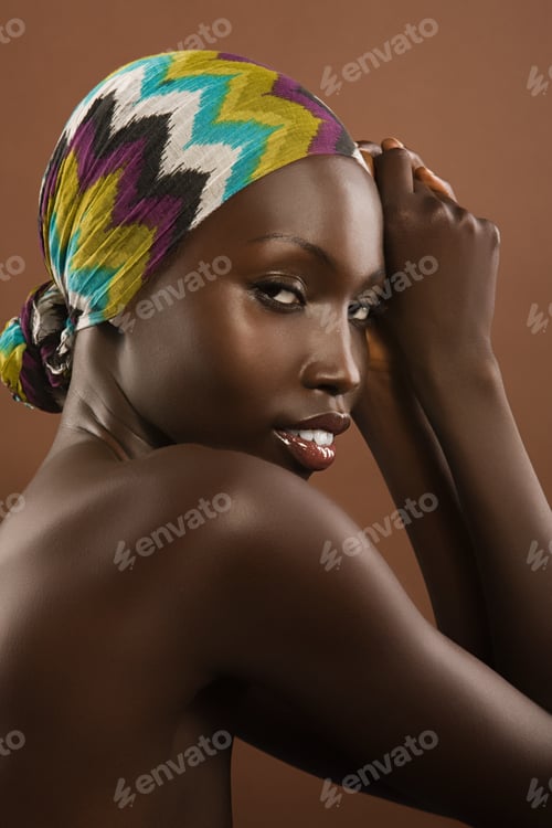 Preview: Portrait of a young woman wearing a headscarf