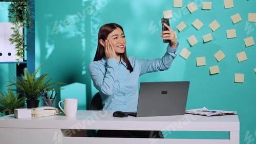 Preview: Employee taking peace sign photo selfies