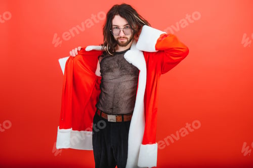 Preview: New Year's LGBT party. A gay man in a Santa suit. Concept of Equality.