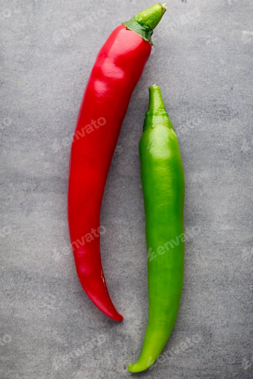 Preview: Chilli pepper on the grey background.