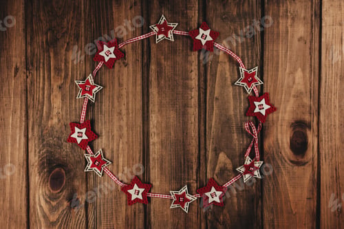 Preview: Christmas background with red wreath of stars