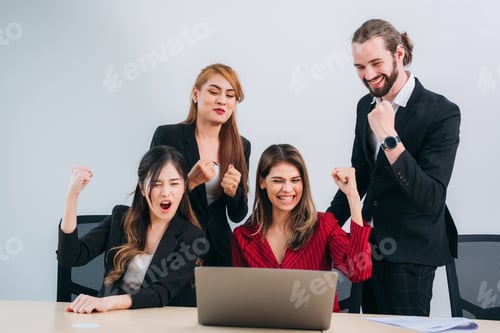 Preview: Group Business using a labtop while working together in office on meeting.