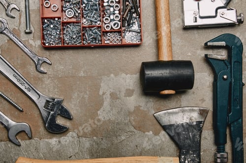 Preview: Top view of various carpentry tools on wooden background