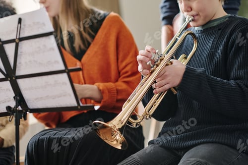 Preview: Kid Playing Trumpet In School Orchestra