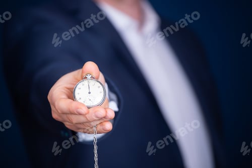 Preview: Businessman with clock in time concept