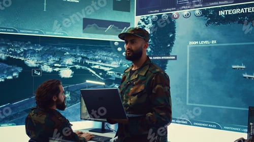 Preview: Men Working with Computers Monitoring Surveillance System