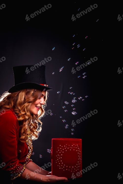 Preview: Magician woman with box soap bubbles show, an illusionist in theatrical clothes