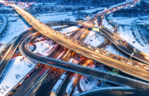 Preview: Aerial view of road in the modern city at night in winter