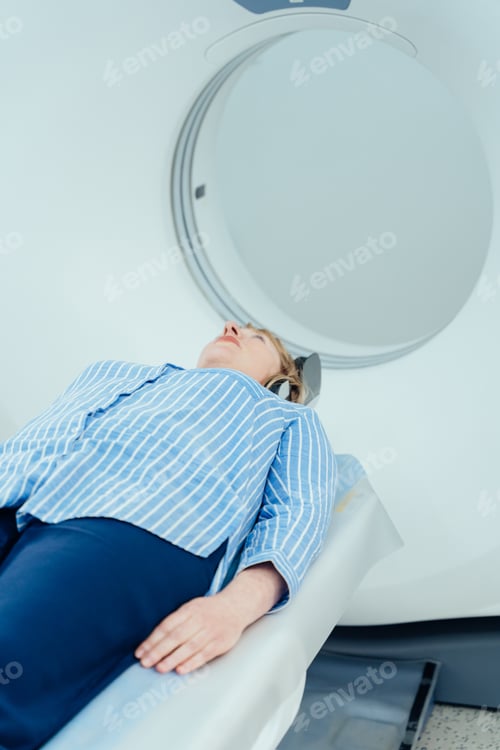 Preview: Woman Laying in CT Scan Machine for Test