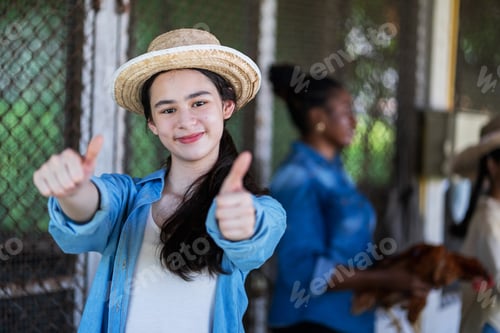 Preview: Local agriculture, Women and teen tending chickens.