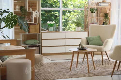 Preview: Stylish sofa and other furniture in living room. Interior design