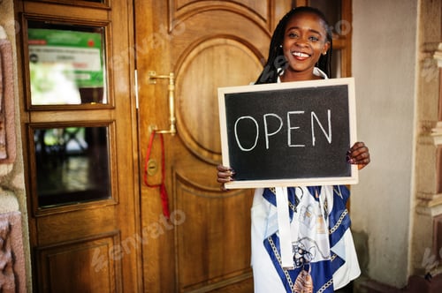Preview: African american woman hold open welcome sign board