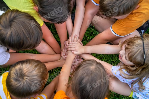 Preview: Children are playing with their hands clasped together. Selective focus.