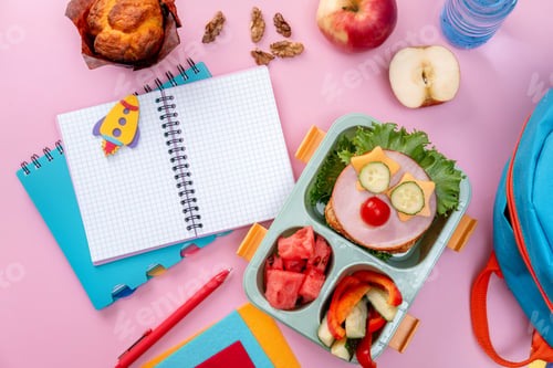 Preview: School lunch box for kids with food in the form of funny faces. School lunch box with sandwich