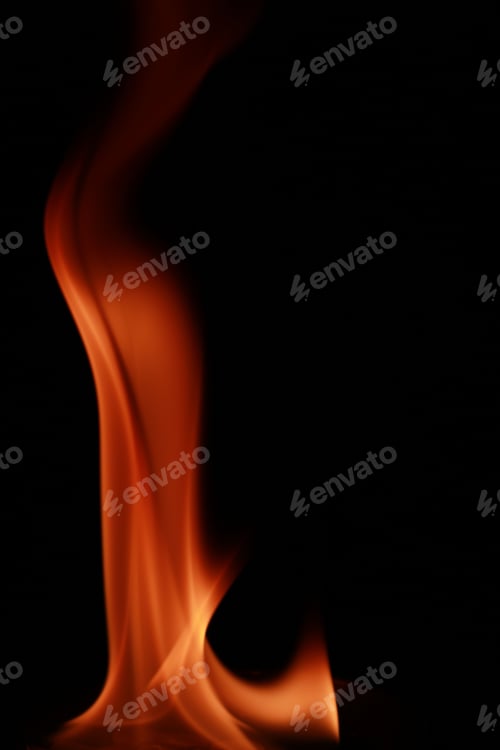 Preview: Vertical shot of flames isolated on a black background for textures