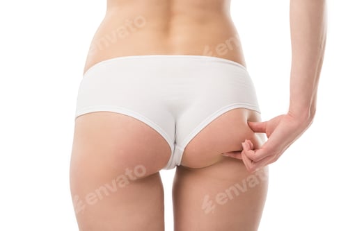 Preview: back view of sexy woman in panties touching buttocks isolated on white