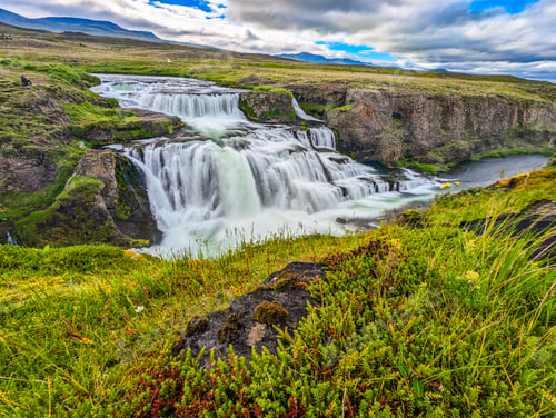 Preview: Aerial drone view of Fosslaug waterfall, Iceland