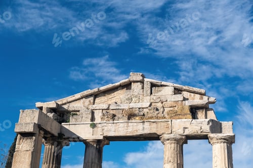 Preview: Roman Agora, Athens Greece. Gate of Athena Archegetis upper part, blue sky background