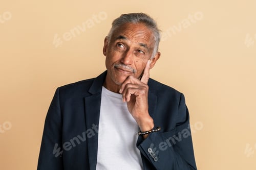 Preview: Thoughtful mixed Indian senior man