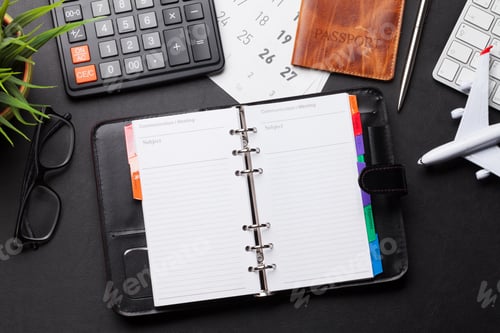 Preview: Business trip concept. Accessories on desk table