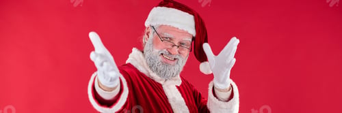 Preview: Smiling Santa Claus Gesturing on Red Background